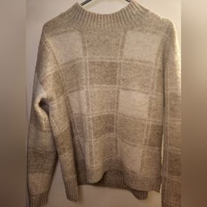 Cozy plaid mock neck sweater